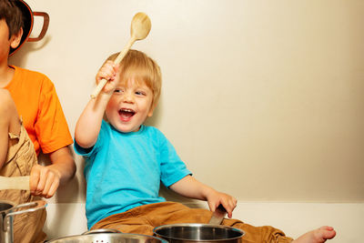 High angle view of cute girl preparing food at home