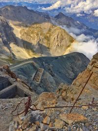 Scenic view of landscape and mountains against sky