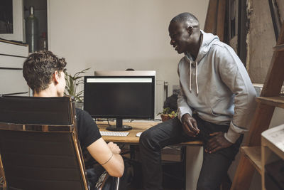 Men sitting on table