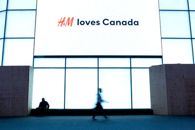 Text on glass window at airport