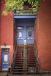 Steps against red brick wall