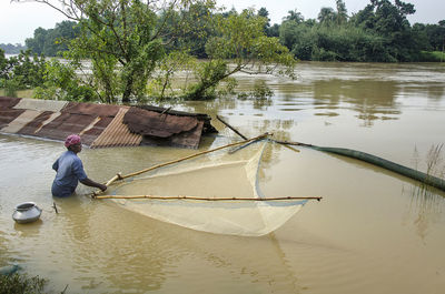 Man fishing in river 