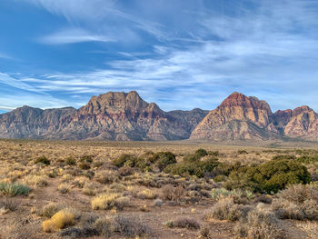 Scenic view of rocky mountains against sky