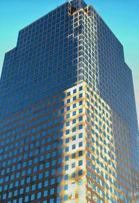 Low angle view of modern building against sky