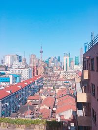 Cityscape against blue sky