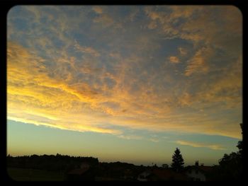 Scenic view of landscape at sunset