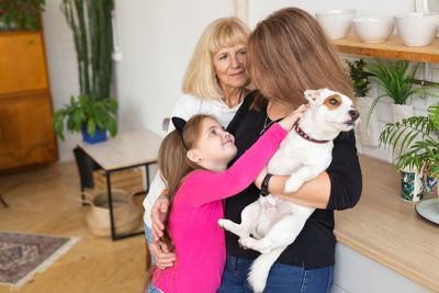 Portrait of woman with dog