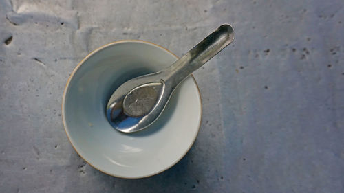 High angle view of empty coffee cup on table