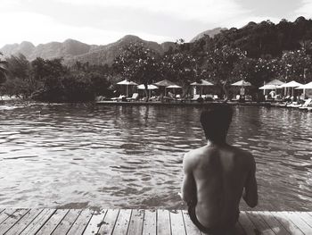 Lake with mountains in background
