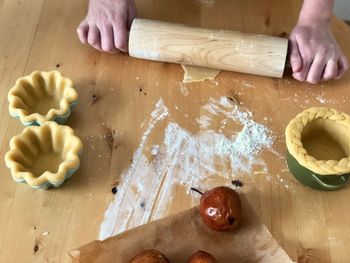 High angle view of person preparing food on table