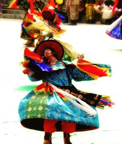 Full frame shot of decorated holding colorful umbrella