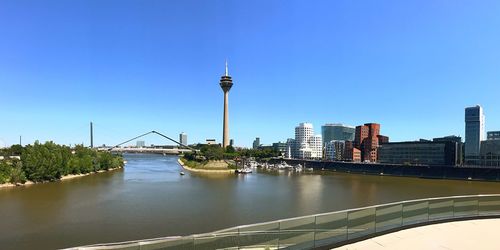 View of bridge and buildings against sky