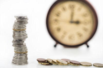 Close-up of coins on white background