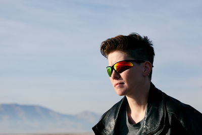 Man wearing sunglasses against clear sky