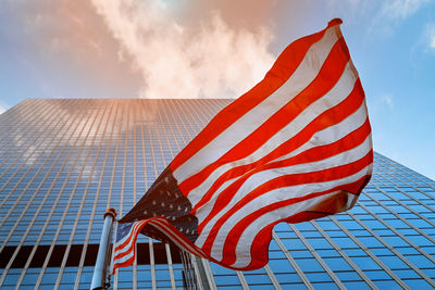 Low angle view of flag against sky