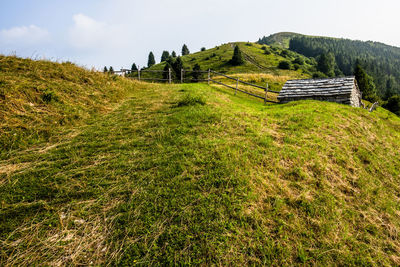 Stone shelter among the green meadows on the mountains above revine lago treviso veneto italy