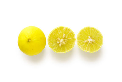 Close-up of fruits against white background