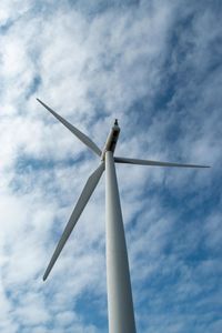 Low angle view of wind turbine against sky