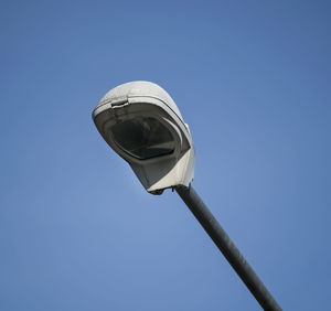 Low angle view of built structure against clear blue sky