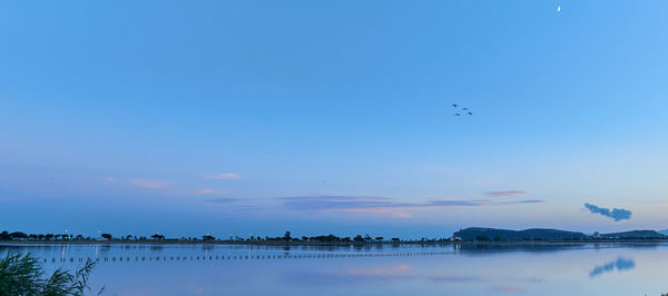 Scenic view of sea  against sky during sunset