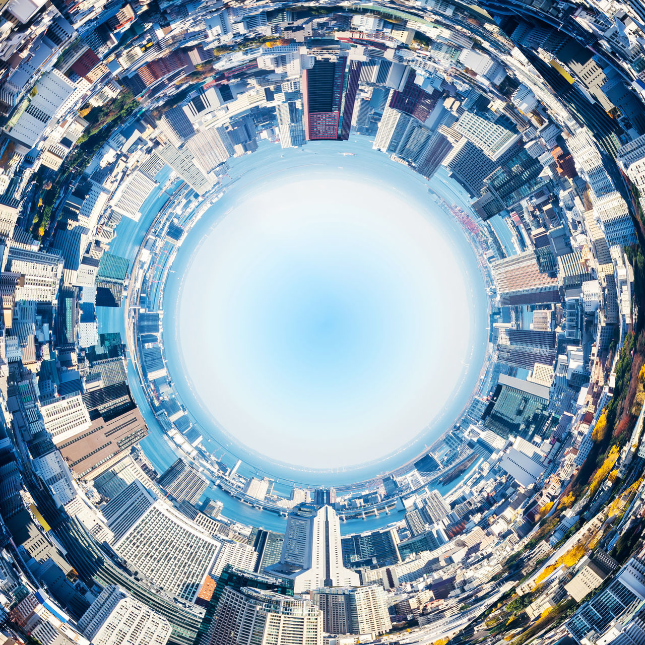 HIGH ANGLE VIEW OF BUILDINGS AGAINST SKY