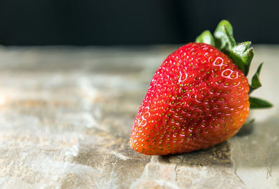 Close-up of strawberry on table