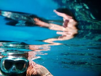 Underwater view of person snorkelling 
