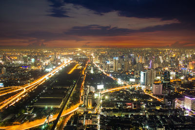 High angle view of illuminated city at night