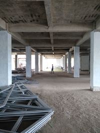 Rear view of man standing in abandoned building