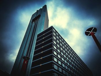 Low angle view of modern buildings against sky