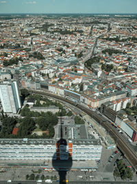 High angle view of illuminated city buildings against sky