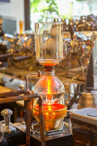 Close-up of glass jar on table at restaurant