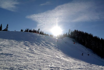 Scenic view of snowcapped mountain against sky