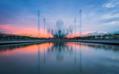 Illuminated buildings in water