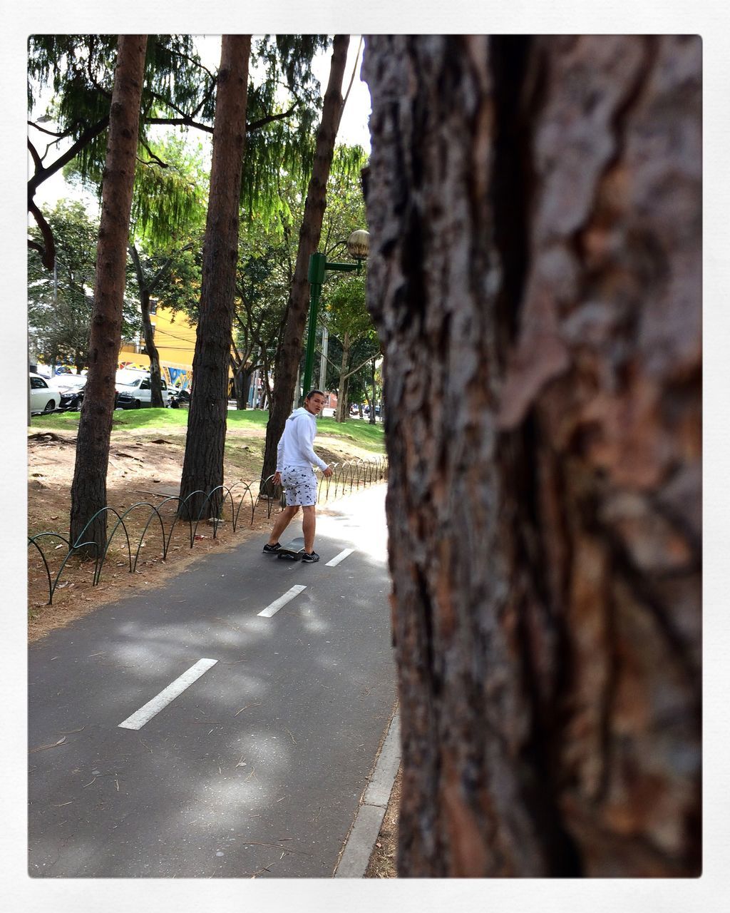 MAN WALKING ON FOOTPATH