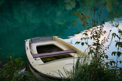 High angle view of boat floating on lake