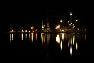 Reflection of illuminated buildings in water