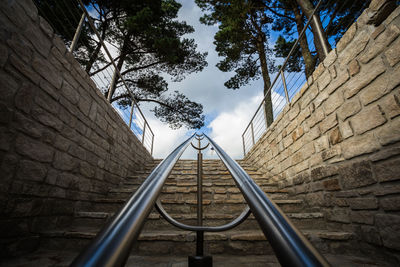 Low angle view of staircase against sky