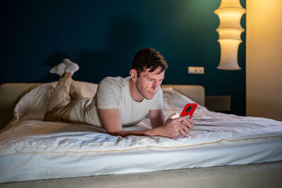 Young woman sleeping on bed at home