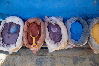 High angle view of various shoes on wall