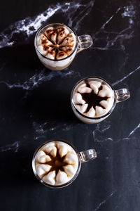 Assortment of mini chocolate desserts in the glass. mini choloate desserts on a rustic background