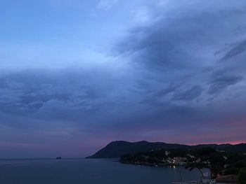 Scenic view of sea against sky at sunset