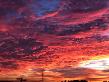 Low angle view of dramatic sky during sunset