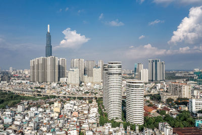 Modern buildings in city against sky