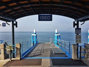 Pier over sea against sky