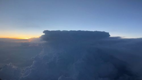 Scenic view of cloudscape against sky during sunset