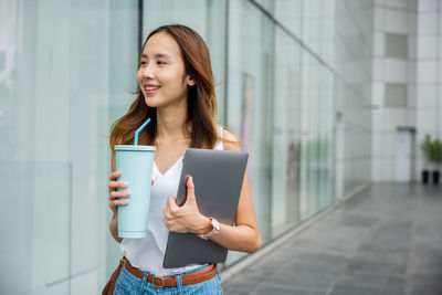 Young woman using mobile phone