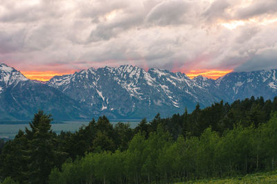 Sunset rays over the teton mountains