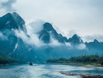 Scenic view of sea against dramatic sky