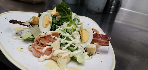 High angle view of meal served in plate ceaser salad 